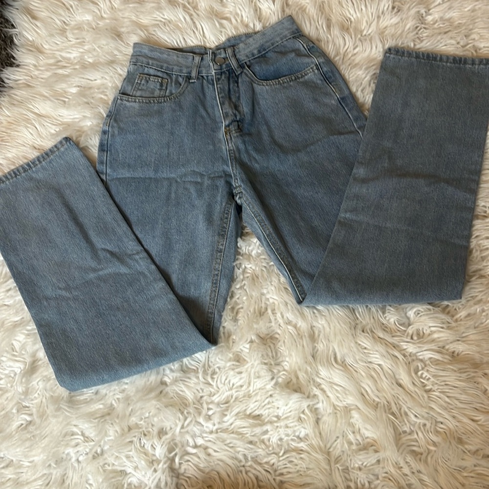 SHEIN blue jeans for woman that are size XXS.